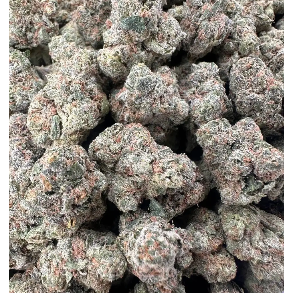 Lemon Cherry Fuel THCa Flower buds with frosty trichomes, dense green nugs, and a lemon, cherry, and diesel-inspired aroma profile.