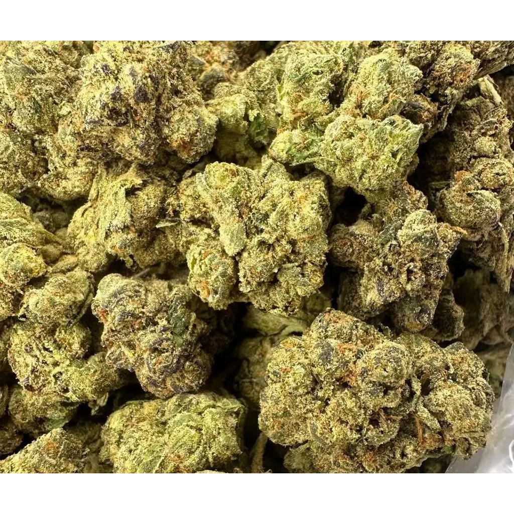 PEZ THCa Flower buds featuring frosty trichomes, dense green nugs, and a sweet, fruity candy-inspired aroma profile.
