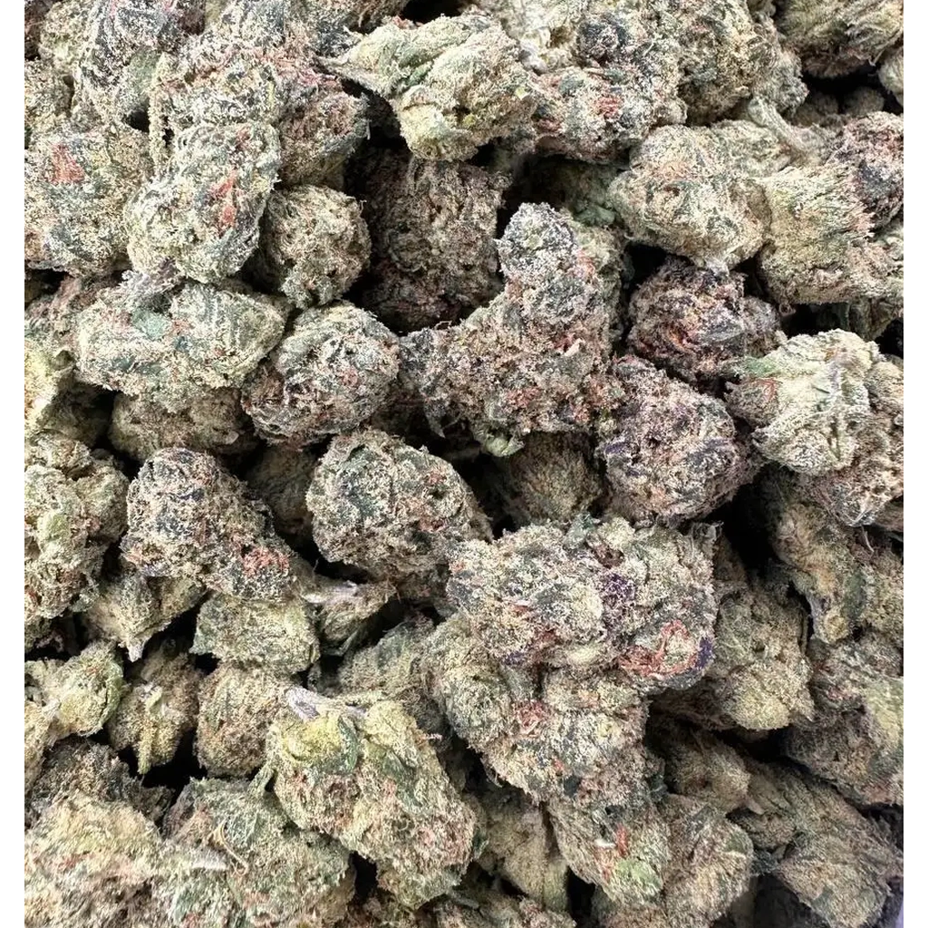 Schmega LCG THCa Flower buds showing natural flower structure, visible trichomes, and green color variations.